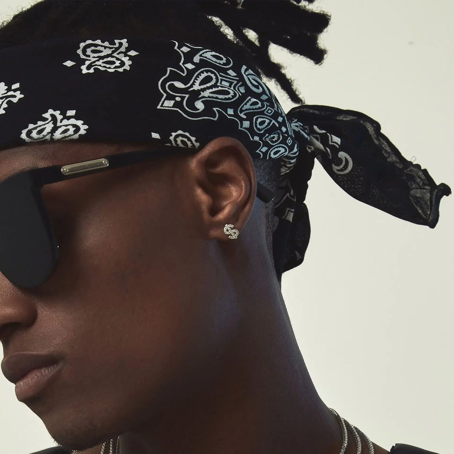 Iced Out Dollar Sign Stud Earrings